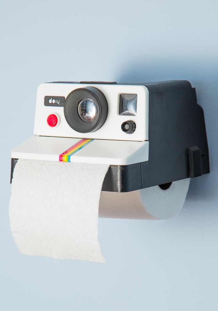 Polaroid toilet tissue holder - hilarious! #product_design