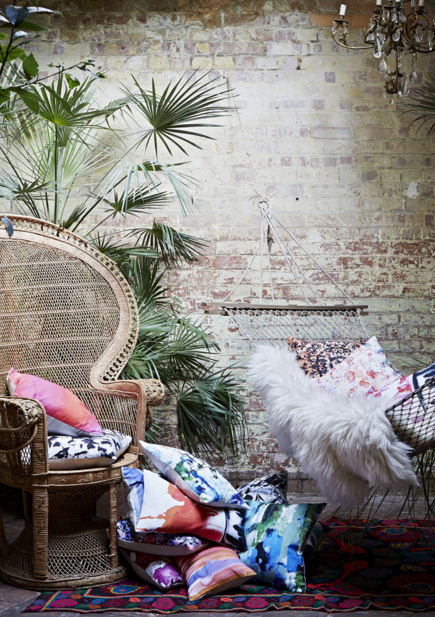 Beautiful boho living room with cushions by Amy Sia
